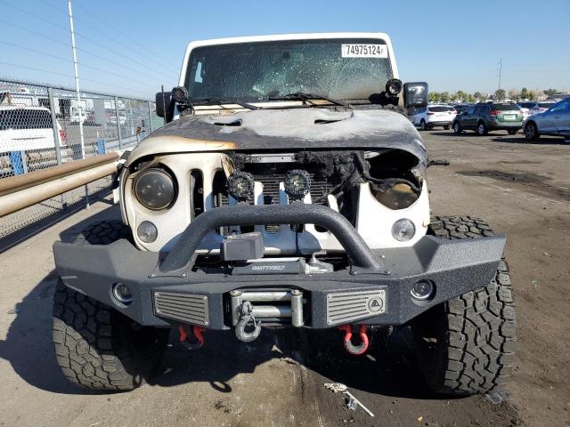Photo 5 from auction – 2016 JEEP WRANGLER U with VIN 1C4HJWFG0GL231223