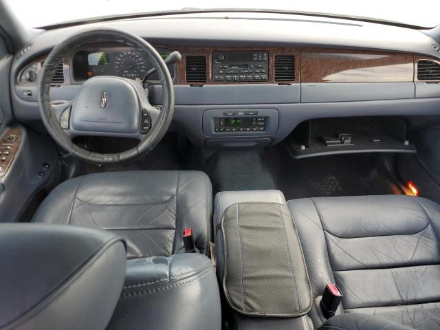 Photo 8 from auction – 1999 LINCOLN TOWN CAR E with VIN 1LNHM81W0XY659504