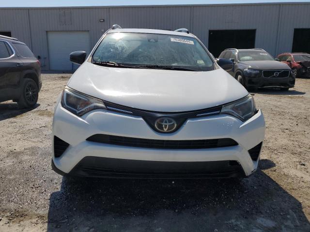 Photo 5 from auction – 2018 TOYOTA RAV4 LE with VIN JTMZFREV2JJ158723