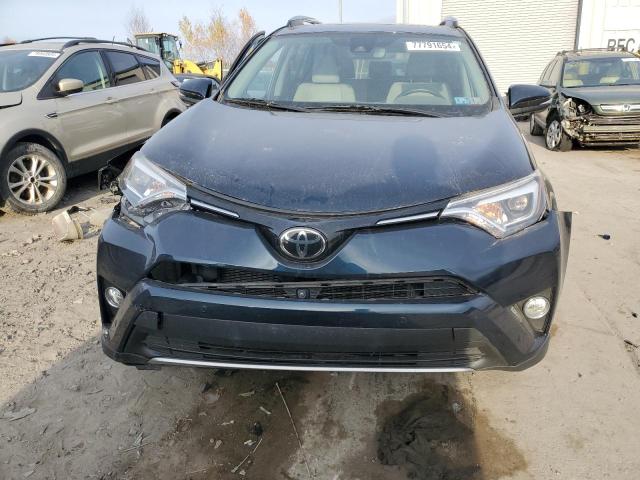 Photo 5 from auction – 2018 TOYOTA RAV4 LIMIT with VIN 2T3DFREV4JW739913