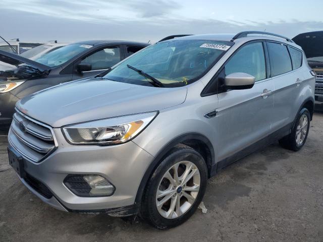 FORD ESCAPE SE 2018 with VIN 1FMCU9GD6JUC00661 - Photo from auction