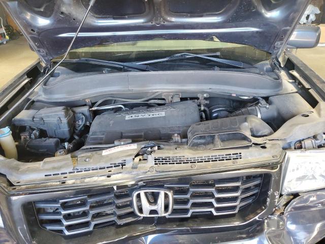 Photo 11 from auction – 2011 HONDA RIDGELINE with VIN 5FPYK1F58BB454689