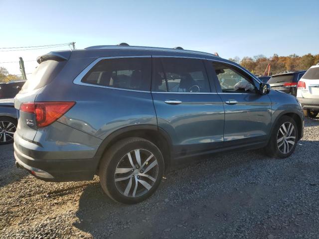 Photo 3 from auction – 2018 HONDA PILOT ELIT with VIN 5FNYF6H02JB041872