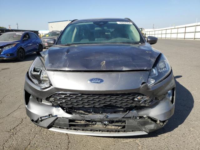 Photo 5 from auction – 2021 FORD ESCAPE SEL with VIN 1FMCU9H63MUB04409