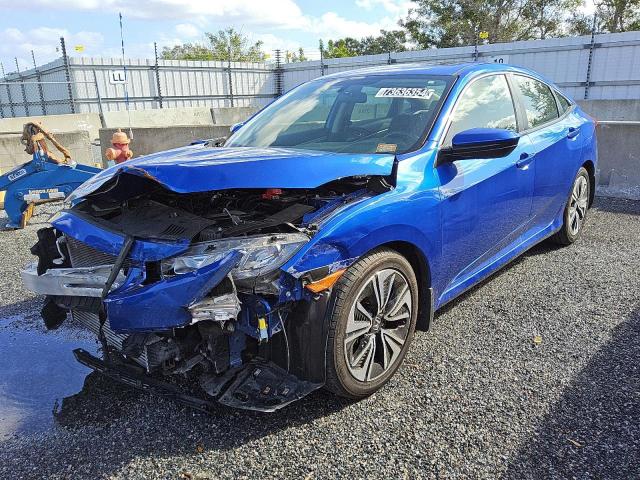 HONDA CIVIC EX 2018 with VIN JHMFC1F32JX019343 - Photo from auction