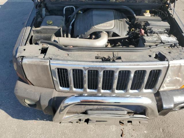 Photo 12 from auction – 2006 JEEP COMMANDER with VIN 1J8HG582X6C215516