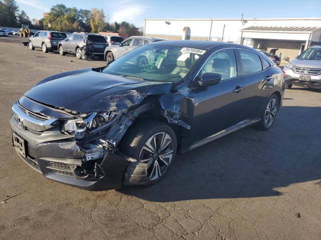 Photo 1 from auction – 2017 HONDA CIVIC EX with VIN 19XFC1F35HE210587