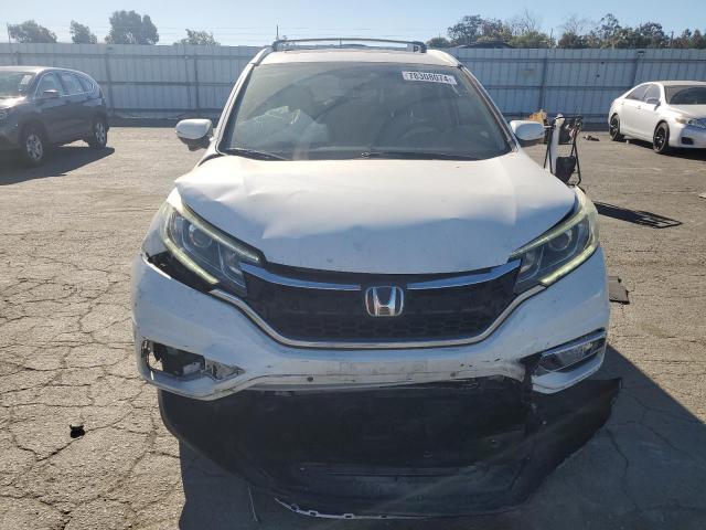 Photo 5 from auction – 2016 HONDA CR-V TOURI with VIN 5J6RM3H98GL028910