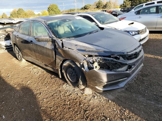 Photo 4 from auction – 2019 HONDA CIVIC LX with VIN 19XFC2F61KE031406