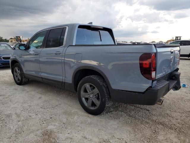 Photo 2 from auction – 2022 HONDA RIDGELINE with VIN 5FPYK3F55NB034033