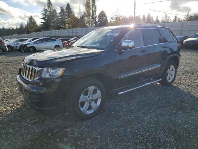 JEEP GRAND CHER 2011 with VIN 1J4RR4GG2BC633232 - Photo from auction