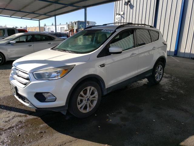 FORD ESCAPE SE 2018 with VIN 1FMCU0GD0JUC90837 - Photo from auction