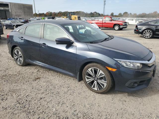Photo 4 from auction – 2017 HONDA CIVIC EX with VIN 19XFC1F30HE014802