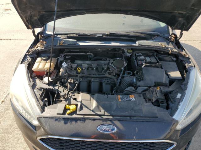 Photo 11 from auction – 2015 FORD FOCUS SE with VIN 1FADP3F23FL361890