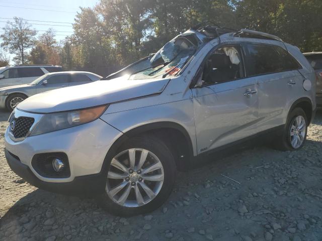 KIA SORENTO EX 2011 with VIN 5XYKUDA26BG040858 - Photo from auction