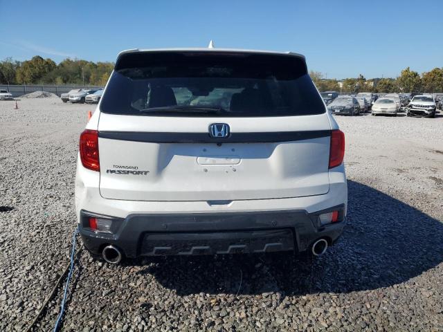Photo 6 from auction – 2022 HONDA PASSPORT E with VIN 5FNYF7H51NB003184