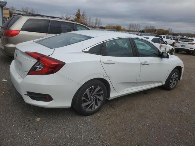 Photo 3 from auction – 2017 HONDA CIVIC EX with VIN 2HGFC2F83HH027244