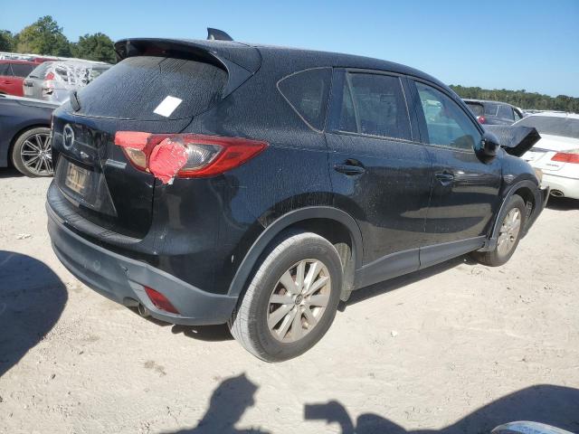 Photo 3 from auction – 2014 MAZDA CX-5 TOURI with VIN JM3KE2CY2E0353149