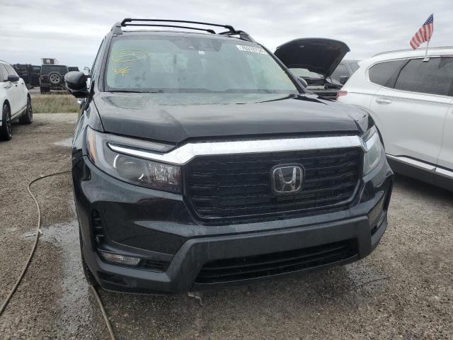 Photo 5 from auction – 2023 HONDA RIDGELINE with VIN 5FPYK3F73PB033967