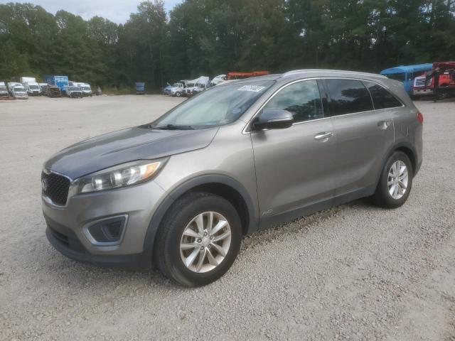 KIA SORENTO LX 2016 with VIN 5XYPGDA33GG058781 - Photo from auction