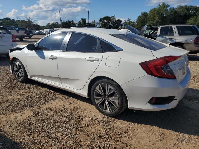 Photo 2 from auction – 2016 HONDA CIVIC EX with VIN 2HGFC1F32GH644454