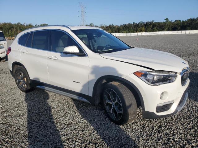 Photo 4 from auction – 2017 BMW X1 XDRIVE2 with VIN WBXHT3C30H5F70540