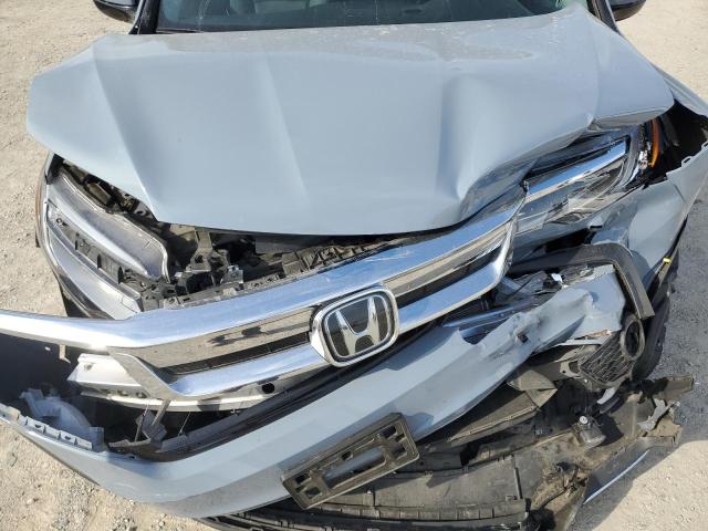 Photo 12 from auction – 2022 HONDA PILOT TOUR with VIN 5FNYF6H60NB068420