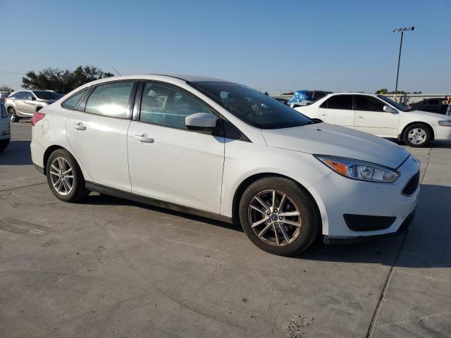 Photo 4 from auction – 2018 FORD FOCUS SE with VIN 1FADP3F21JL216758