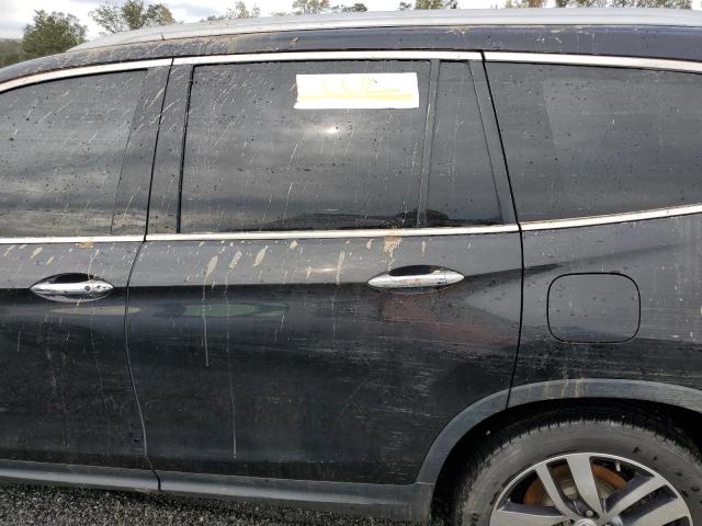 Photo 13 from auction – 2017 HONDA PILOT ELIT with VIN 5FNYF6H09HB075558