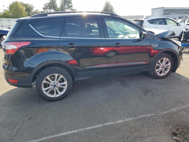 Photo 3 from auction – 2018 FORD ESCAPE SE with VIN 1FMCU0GD6JUC00400