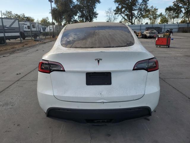 Снимка 6 от търг – 2021 TESLA MODEL Y с VIN 5YJYGDED6MF103688
