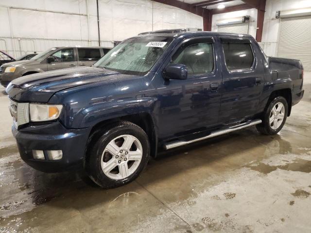HONDA RIDGELINE 2011 with VIN 5FPYK1F52BB003628 - Photo from auction