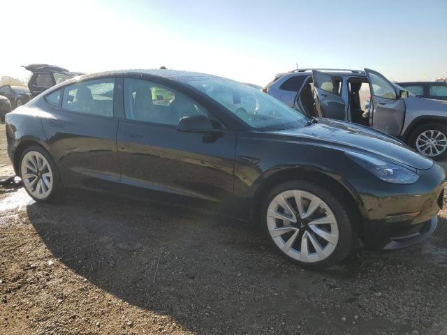 Photo 4 from auction – 2022 TESLA MODEL 3 with VIN 5YJ3E1EA8NF189866
