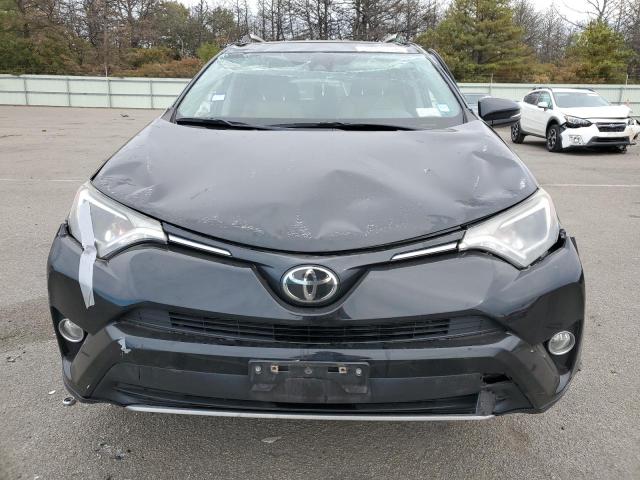 Photo 5 from auction – 2017 TOYOTA RAV4 XLE with VIN 2T3RFREV4HW661925