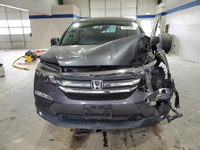 Photo 5 from auction – 2018 HONDA PILOT EXL with VIN 5FNYF5H57JB029626