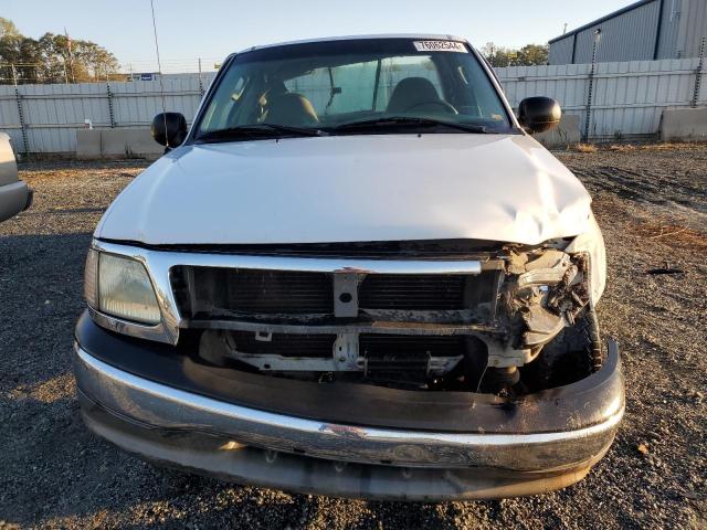 Photo 5 from auction – 2003 FORD F150 with VIN 1FTRF17W33NB06536