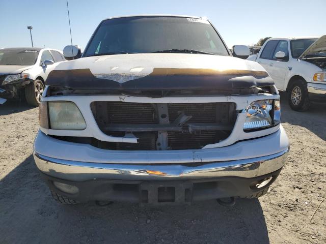 Photo 5 from auction – 2002 FORD F150 with VIN 1FTRX18L92NB67440