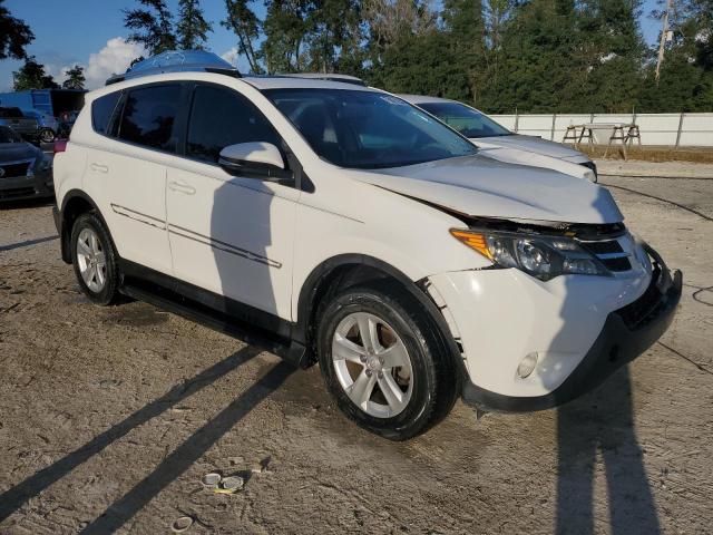 Photo 4 from auction – 2014 TOYOTA RAV4 XLE with VIN JTMWFREV2ED037925