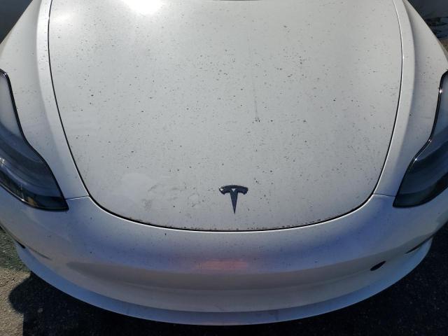 Photo 11 from auction – 2023 TESLA MODEL 3 with VIN 5YJ3E1EA3PF614459