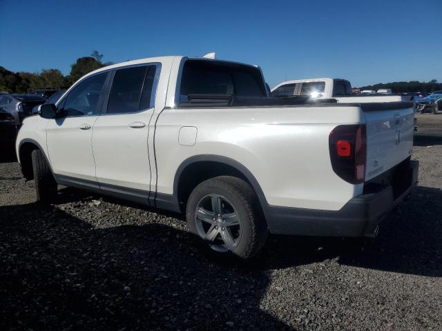 Photo 2 from auction – 2022 HONDA RIDGELINE with VIN 5FPYK3F53NB021006