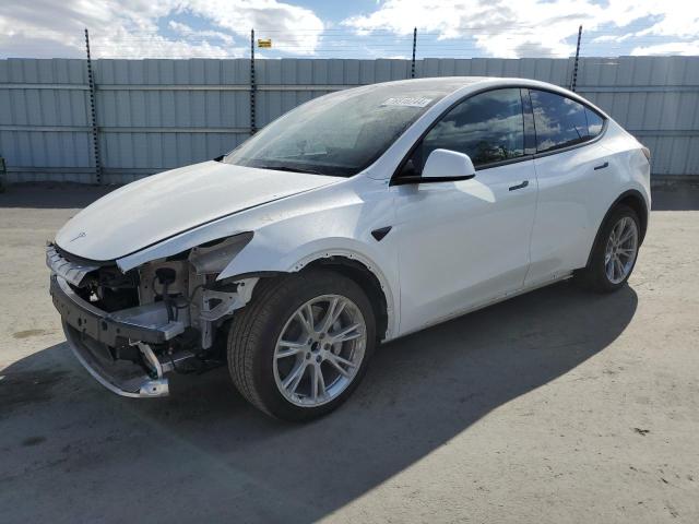 TESLA MODEL Y 2024 with VIN 7SAYGDED6RF044376 - Photo from auction