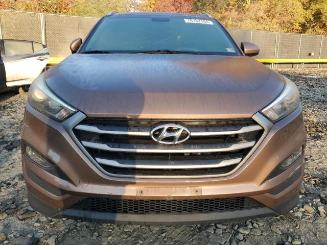Photo 5 from auction – 2016 HYUNDAI TUCSON LIM with VIN KM8J3CA41GU023686