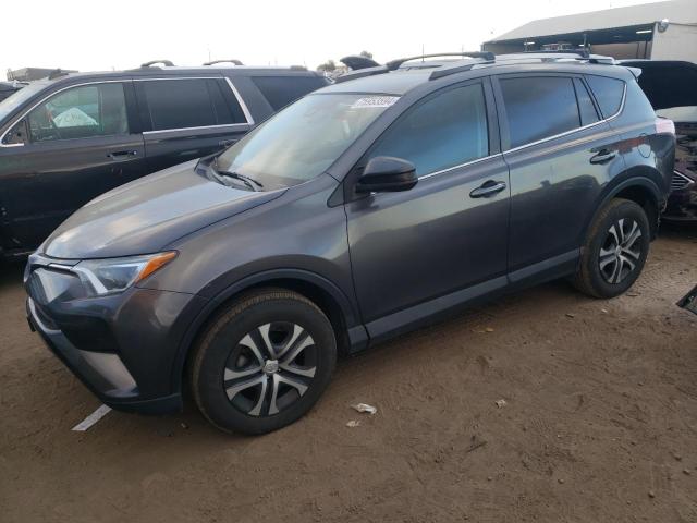 TOYOTA RAV4 LE 2018 with VIN 2T3BFREV3JW786082 - Photo from auction