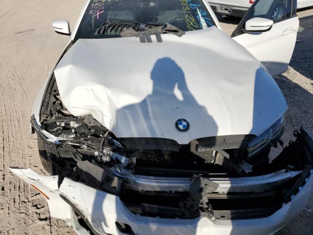 Photo 11 from auction – 2021 BMW 540 I with VIN WBA53BJ05MWX37699