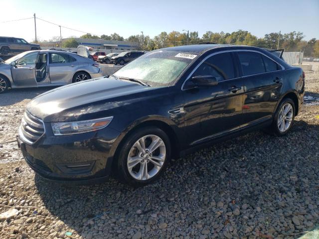 FORD TAURUS SEL 2014 with VIN 1FAHP2E88EG104216 - Photo from auction