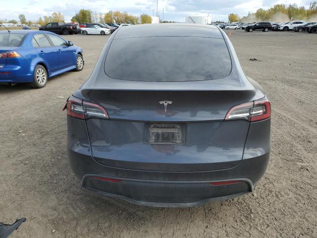 Photo 6 from auction – 2023 TESLA MODEL Y with VIN LRWYGDFD1PC221127