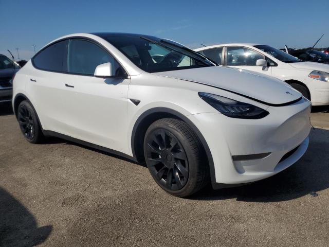 Photo 4 from auction – 2023 TESLA MODEL Y with VIN 7SAYGDEE1PA060777