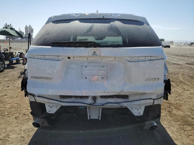 Photo 6 from auction – 2021 HONDA PASSPORT E with VIN 5FNYF8H52MB030771