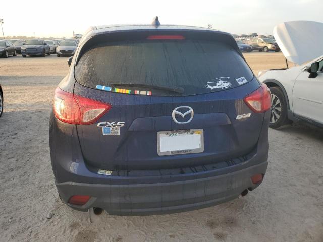 Photo 6 from auction – 2013 MAZDA CX-5 TOURI with VIN JM3KE2CE2D0118593