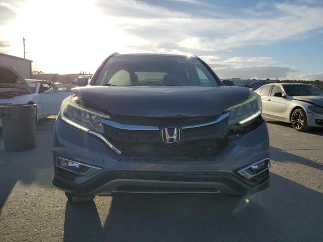 Photo 5 from auction – 2016 HONDA CR-V EXL with VIN 5J6RM4H74GL009047